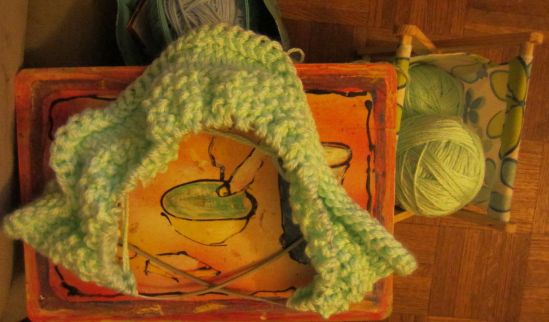 Worried about the present, I'm knitting for the future.