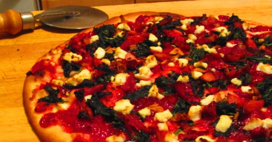 What can you do with the last of your holiday leftovers? Make pizza - in this case, ham, spinach, goat cheese and cranberry sauce, which was very damn delicious.