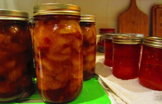 Seven quarts of peach pie filling and four jars of roasted tomato halves with salt and olive oil. Yippee!
